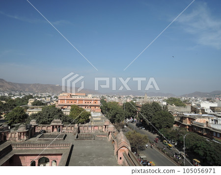 One of the most wonderful sights in Jaipur is the beautiful Jal Mahal or Lake Palace. The light, sand coloured stone walls and the deep blue of the water 105056971