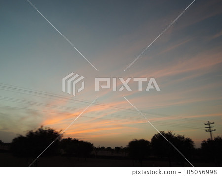 One of the most wonderful sights in Jaipur is the beautiful Jal Mahal or Lake Palace. The light, sand coloured stone walls and the deep blue of the water 105056998