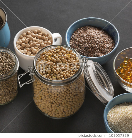 Source of vitamin E and nutrients in bowls on the table, copy space 105057829