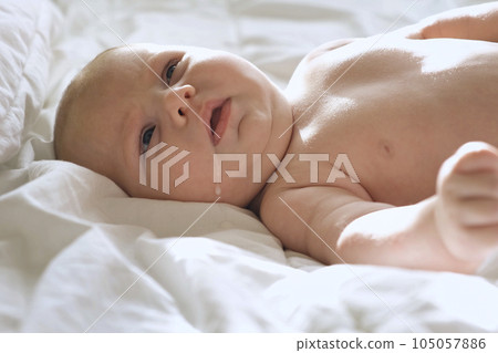 Baby regurgitates breast milk. Little baby with Milk on her Cute Face. Authentic Close Up Footage of Adorable Newborn Baby. Concept of Childhood, New Llife, Breast Feeding, Parenthood. Baby regurgitates breast milk. Little baby with Milk on her Cute Face. Authentic Close Up Footage of Adorable Newborn Baby. Concept of Childhood, New Llife, Breast Feeding, Parenthood. 105057886