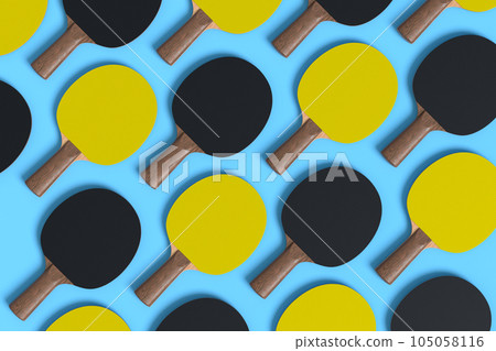 Pattern from ping pong rackets for table tennis on blue background Pattern from ping pong rackets for table tennis on blue background 105058116