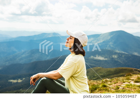 Woman on the top of a mountain Woman on the top of a mountain 105059487