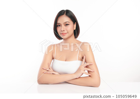 Beautiful young asian woman with clean fresh skin on white background, Face care, Facial treatment, Cosmetology, beauty and spa, Asian women portrait. Beautiful young asian woman with clean fresh skin on white background, Face care, Facial treatment, Cosmetology, beauty and spa, Asian women portrait. 105059649
