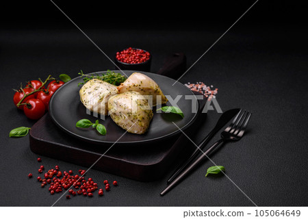 Delicious juicy grilled chicken with salt, spices and herbs with vegetables Delicious juicy grilled chicken with salt, spices and herbs with vegetables 105064649