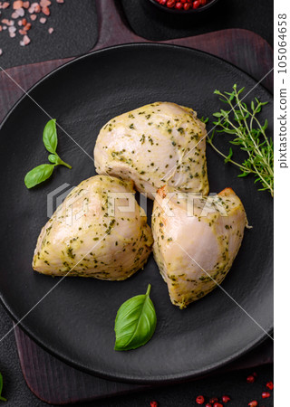 Delicious juicy grilled chicken with salt, spices and herbs with vegetables 105064658