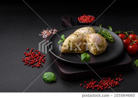 Delicious juicy grilled chicken with salt, spices and herbs with vegetables Delicious juicy grilled chicken with salt, spices and herbs with vegetables 105064660