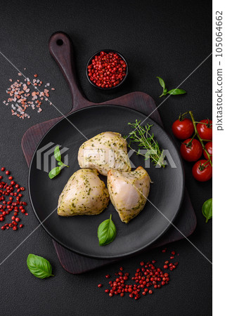Delicious juicy grilled chicken with salt, spices and herbs with vegetables Delicious juicy grilled chicken with salt, spices and herbs with vegetables 105064662