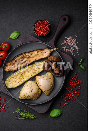 Delicious grilled vegetables zucchini, eggplant, peppers and mushrooms with salt, spices and herbs Delicious grilled vegetables zucchini, eggplant, peppers and mushrooms with salt, spices and herbs 105064679