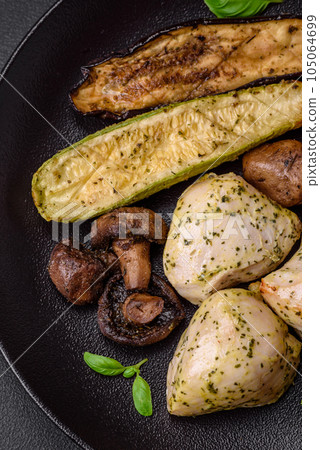Delicious juicy grilled chicken with salt, spices and herbs with vegetables Delicious juicy grilled chicken with salt, spices and herbs with vegetables 105064699