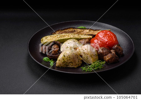Delicious juicy grilled chicken with salt, spices and herbs with vegetables 105064701