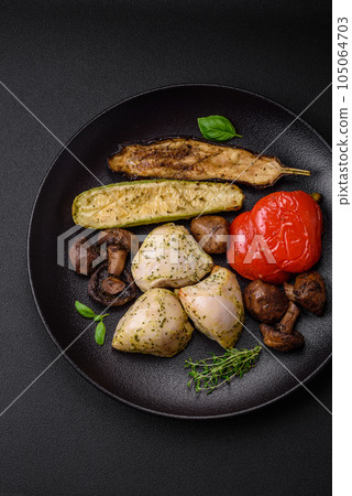 Delicious juicy grilled chicken with salt, spices and herbs with vegetables Delicious juicy grilled chicken with salt, spices and herbs with vegetables 105064703