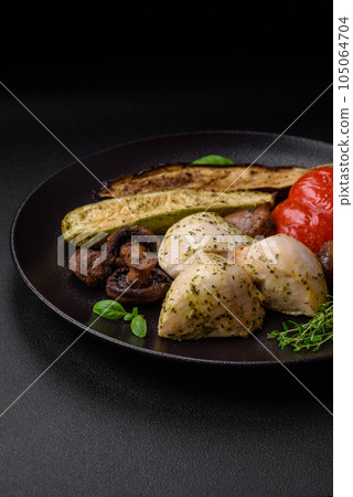 Delicious juicy grilled chicken with salt, spices and herbs with vegetables Delicious juicy grilled chicken with salt, spices and herbs with vegetables 105064704