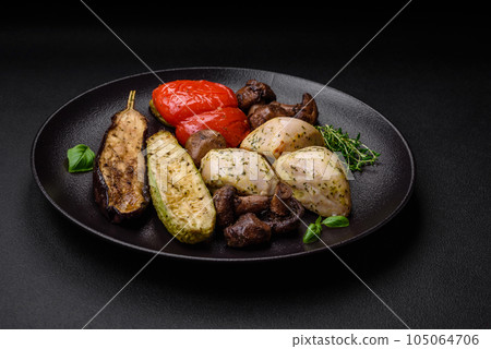 Delicious juicy grilled chicken with salt, spices and herbs with vegetables 105064706