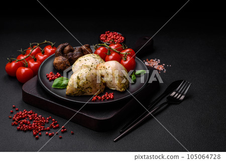 Delicious juicy grilled chicken with salt, spices and herbs with vegetables 105064728