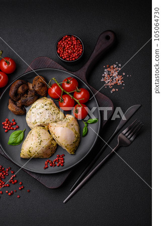 Delicious juicy grilled chicken with salt, spices and herbs with vegetables Delicious juicy grilled chicken with salt, spices and herbs with vegetables 105064730