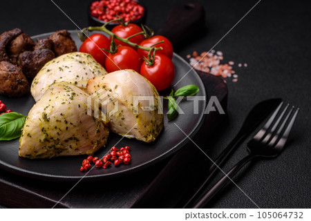 Delicious juicy grilled chicken with salt, spices and herbs with vegetables 105064732