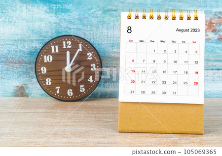 The August 2023 Monthly desk calendar for 2023 year and wooden clock. The August 2023 Monthly desk calendar for 2023 year and wooden clock. 105069365