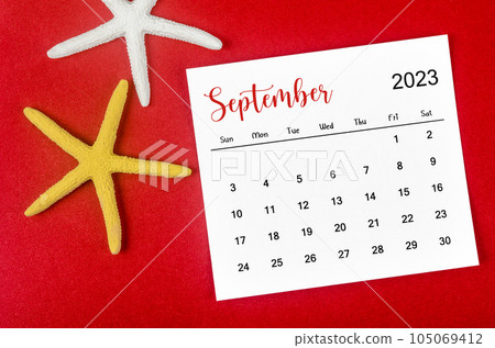 The September 2023 Monthly calendar with Starfish on red background. 105069412