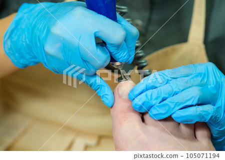 Hardware pedicure. Foot and toe treatment Hardware pedicure. Foot and toe treatment 105071194