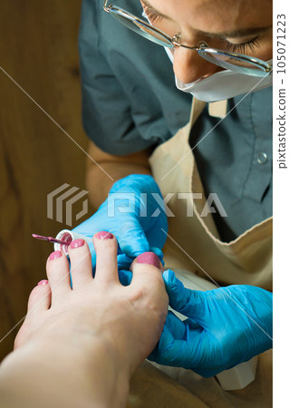 Pedicure. Gel polish coating Pedicure. Gel polish coating 105071223