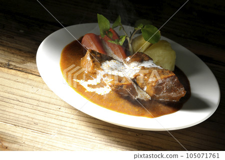Hot Beef Stew with Watercress, Carrot, Potato Garnish and Thick Cut Beef Tongue Covered with Cream 105071761