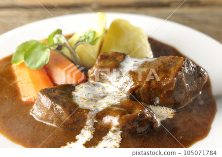 Hot Beef Stew with Watercress, Carrot, Potato Garnish and Thick Cut Beef Tongue Covered with Cream Hot Beef Stew with Watercress, Carrot, Potato Garnish and Thick Cut Beef Tongue Covered with Cream 105071784