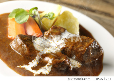 Hot Beef Stew with Watercress, Carrot, Potato Garnish and Thick Cut Beef Tongue Covered with Cream Hot Beef Stew with Watercress, Carrot, Potato Garnish and Thick Cut Beef Tongue Covered with Cream 105071785