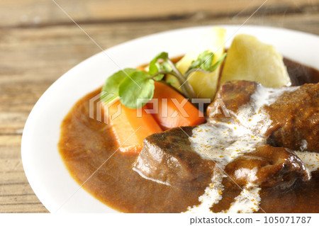 Hot Beef Stew with Watercress, Carrot, Potato Garnish and Thick Cut Beef Tongue Covered with Cream Hot Beef Stew with Watercress, Carrot, Potato Garnish and Thick Cut Beef Tongue Covered with Cream 105071787