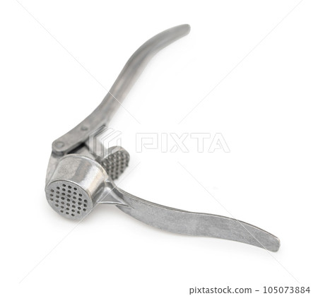 garlic press tool closeup garlic press tool closeup 105073884