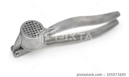 garlic press tool closeup garlic press tool closeup 105073885