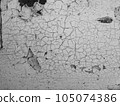 Cracks and fissures in the grunge texture material (white) paint 105074386