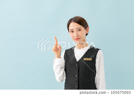 Woman in uniform Pointing 105075003