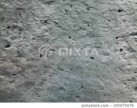 Texture of a light gray concrete wall with holes, strokes, granules, scratches and scuffs. For design and decoration. Photo Texture of a light gray concrete wall with holes, strokes, granules, scratches and scuffs. For design and decoration. Photo 105075076