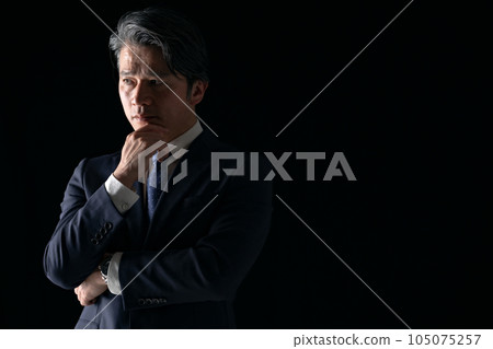 thinking businessman thinking businessman 105075257