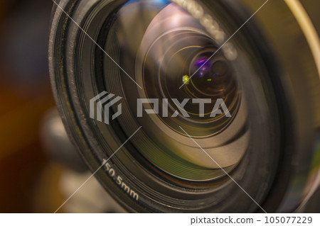 background glare in the lens of the lens background glare in the lens of the lens 105077229