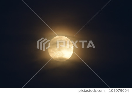 Hakushu Town, Hokuto City, small moon in July rising between clouds 105079004