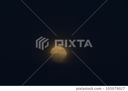 Hakushu Town, Hokuto City, small moon in July rising between clouds 105079027