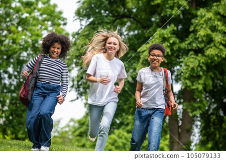 Group of young people feeling excited and happy in the park Group of young people feeling excited and happy in the park 105079133