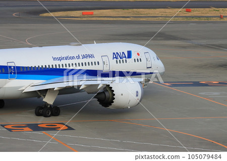 Passenger plane heading to the runway Jet plane Airport travel image Departure image 105079484