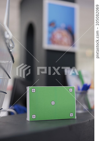 Green screen mock up chroma key vitamins packages standing on counter desk in health care facility, ready for customers to come and buy medical treatment. Pharmacy filled with drugs and supplements Green screen mock up chroma key vitamins packages standing on counter desk in health care facility, ready for customers to come and buy medical treatment. Pharmacy filled with drugs and supplements 105082069