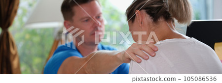 Male doctor reassures female patient with bad diagnosis. Male doctor reassures female patient with bad diagnosis. 105086536