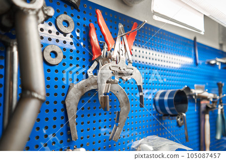 Tools of Car mechanic for a new piston for the engine, overhaul. Interior of a car repair shop. Tools of Car mechanic for a new piston for the engine, overhaul. Interior of a car repair shop. 105087457