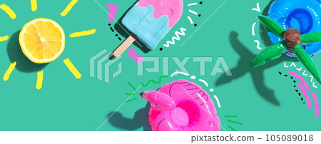 Summer concept with a flamingo float, lemon sunlight and a popsicle Summer concept with a flamingo float, lemon sunlight and a popsicle 105089018