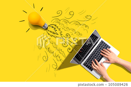 Idea light bulb flying to the sky like a rocket from a laptop computer 105089426