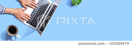 Person using a laptop computer 105089479