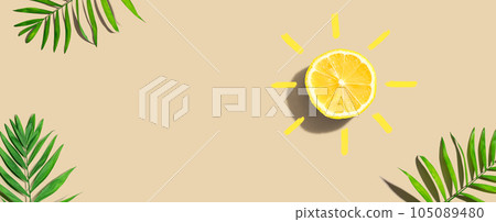 Summer concept with lemon sunlight with palm leaves 105089480