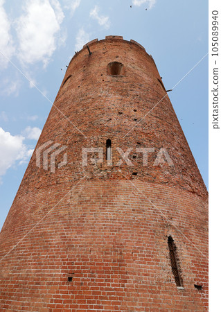 Belaya Vezha tower. From red brick. Against the background of the sky. 105089940