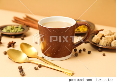 Traditional Indian hot drink with milk and spices - Masala tea 105090188