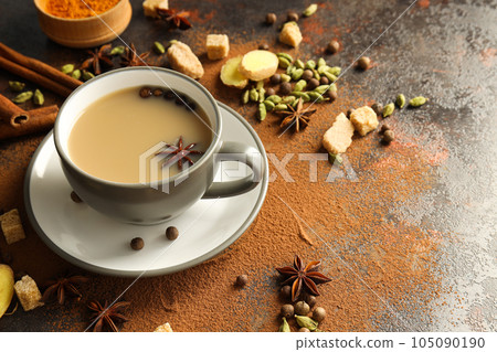 Traditional Indian hot drink with milk and spices - Masala tea 105090190