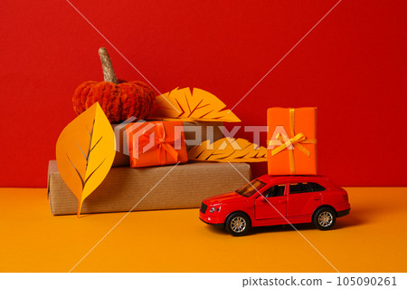 Autumn or fall travel and vacation concept with car Autumn or fall travel and vacation concept with car 105090261